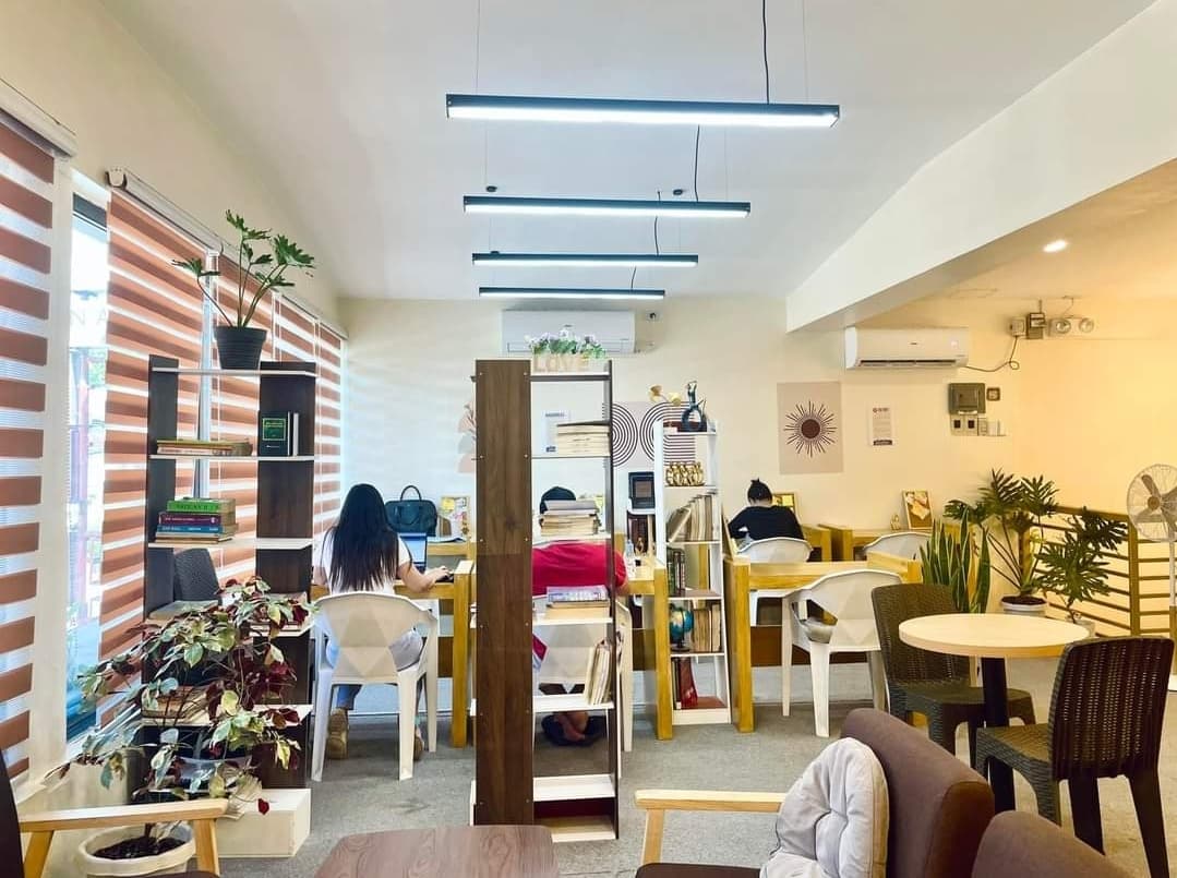 Wide view of WeeCup Call Cafe seating and study areas