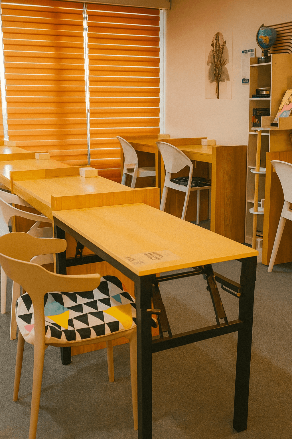 Students studying at WeeCup Call Cafe tables