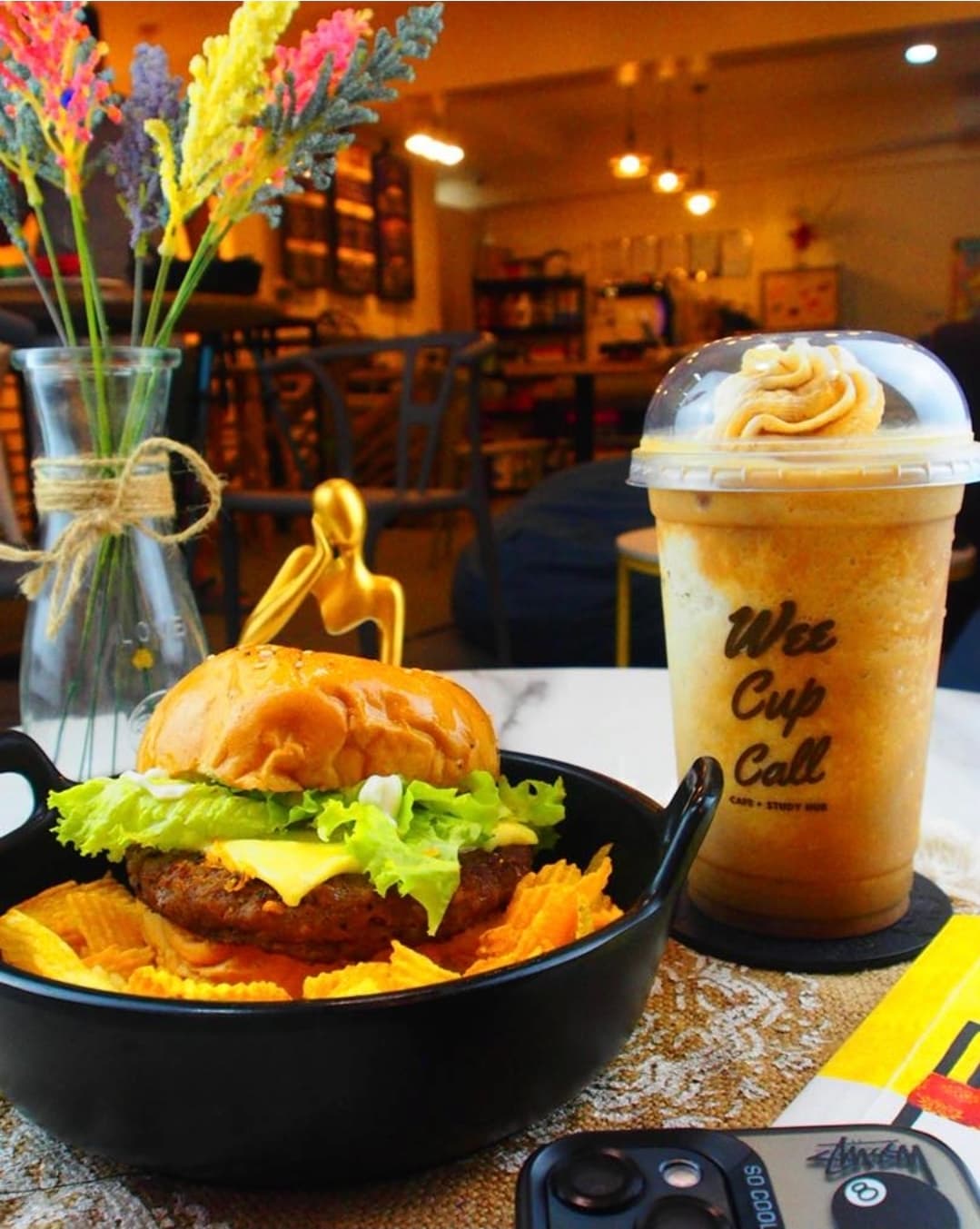 Burger and chiller drink served at WeeCup Call Cafe