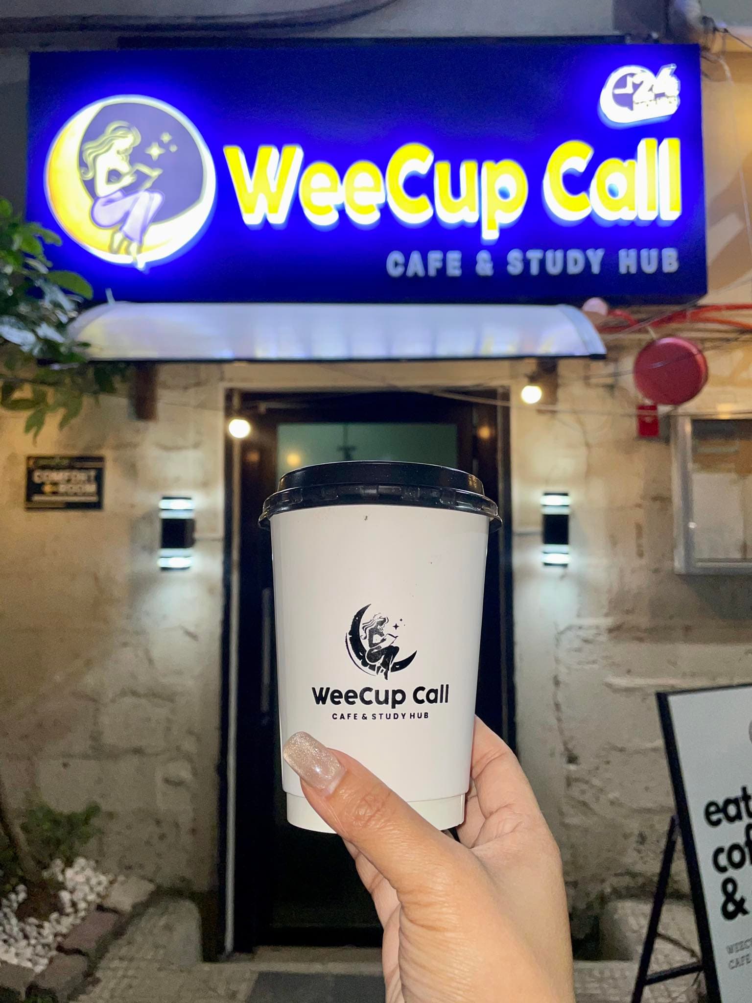 WeeCup Call Cafe branded coffee cup
